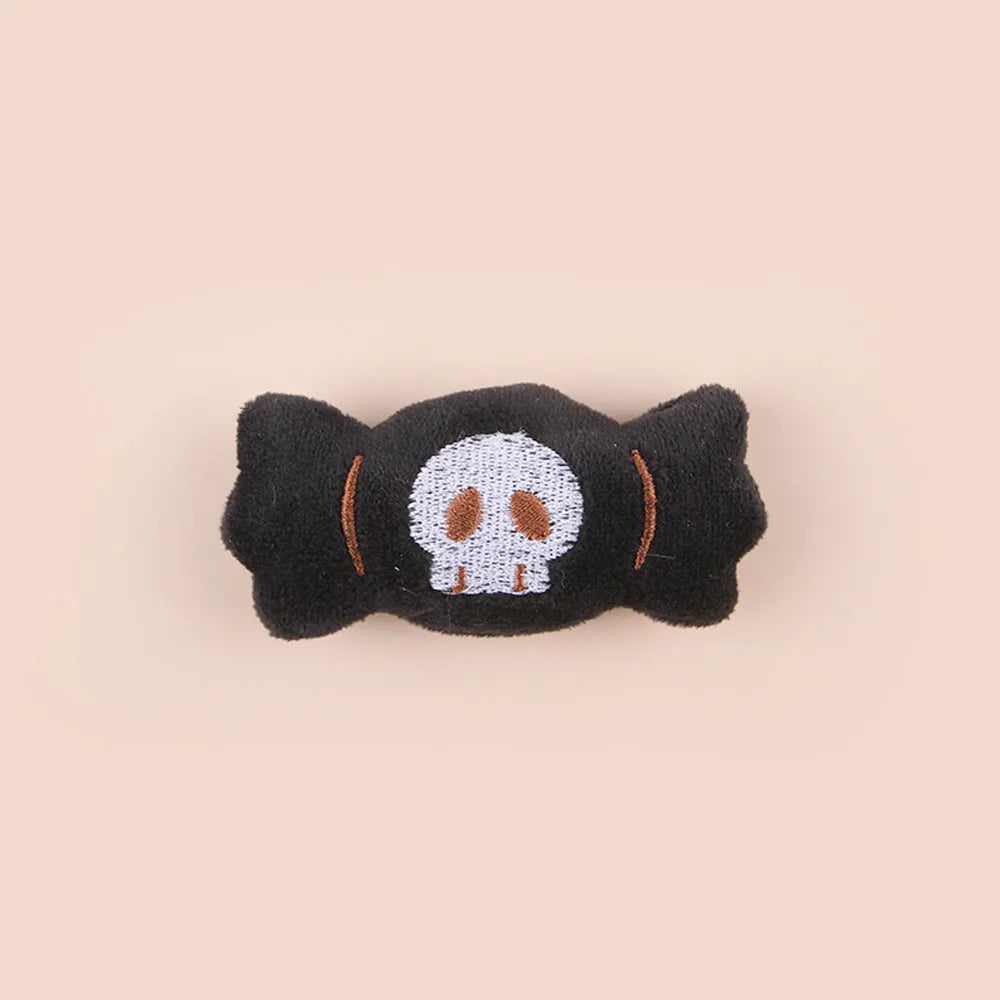 Colourful plush cat teaser wand with candy, eyes and skull animal shapes for interactive play