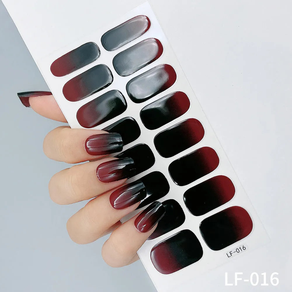 Sheet of 16 solid colour nail art sticker designs including cross, rose, and leopard print patterns.