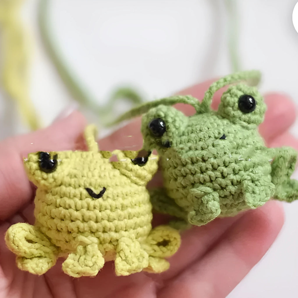 Handmade woven plush frog car pendant measuring 5cm wide by 5cm high by 15cm long
