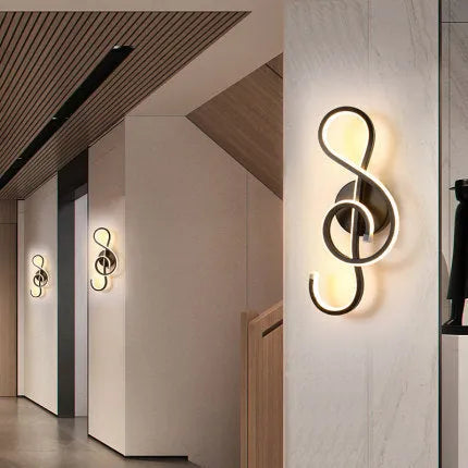 Minimalist Nordic-style LED wall lamp mounted on a wall, shown in a black finish with a soft glow.
