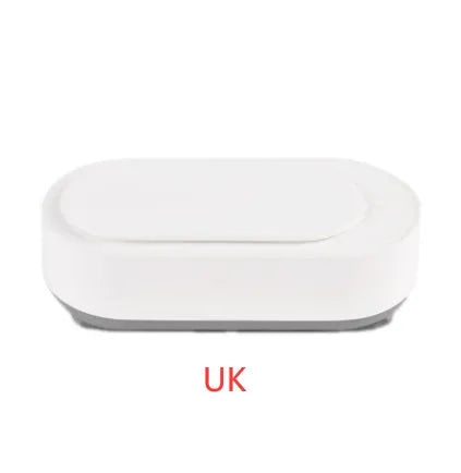 White portable ultrasonic cleaning machine with a stainless steel tank for jewellery and glasses.