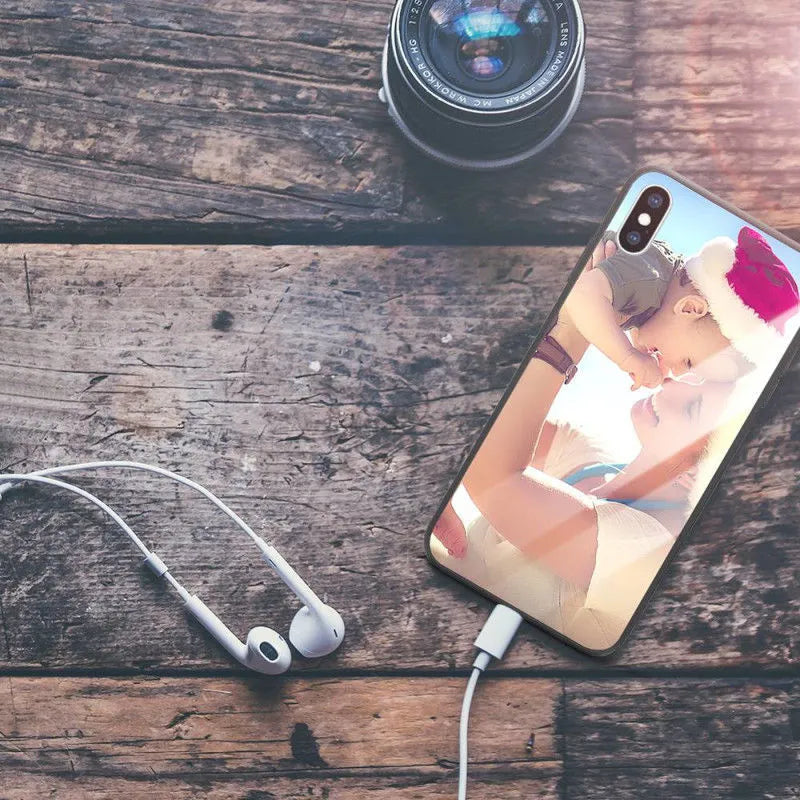 Slim protective case for iPhone with raised bumper edge around screen and camera.