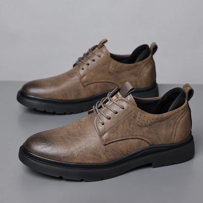 Men's black and brown leather casual sneaker with rubber sole and decorative sewing line detailing