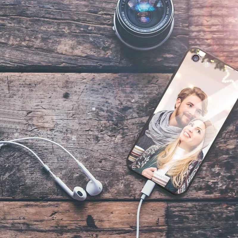 Slim protective case for iPhone with raised bumper edge around screen and camera.