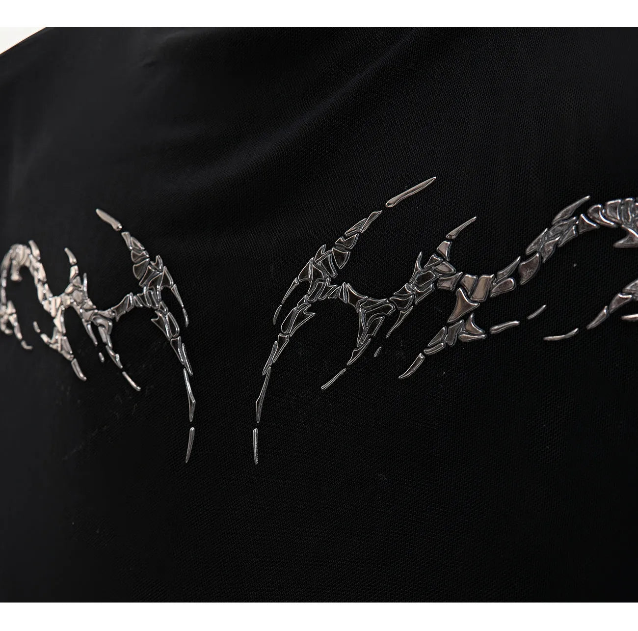 Black niche mesh ice-feeling slim bottoming long sleeve shirt on a mannequin, showing the trendy fit.