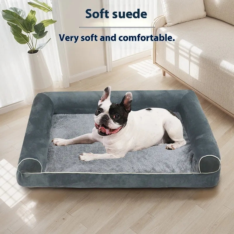 A square, cloth-covered sponge dog bed shown in blue, with a dog resting on it.