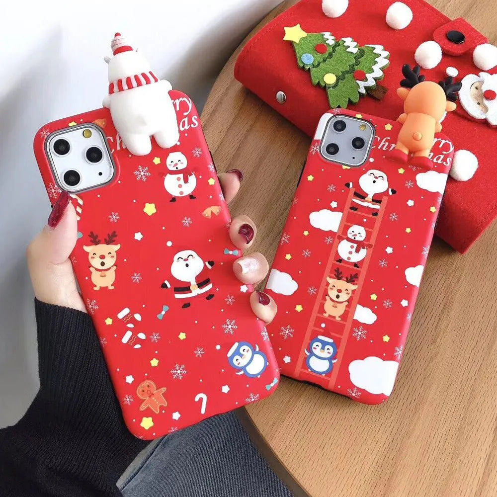 Red Christmas-themed silicone phone case on an iPhone, showing festive back cover design.