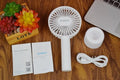 White ORICO FH1 portable USB desk fan with rechargeable battery on a desk