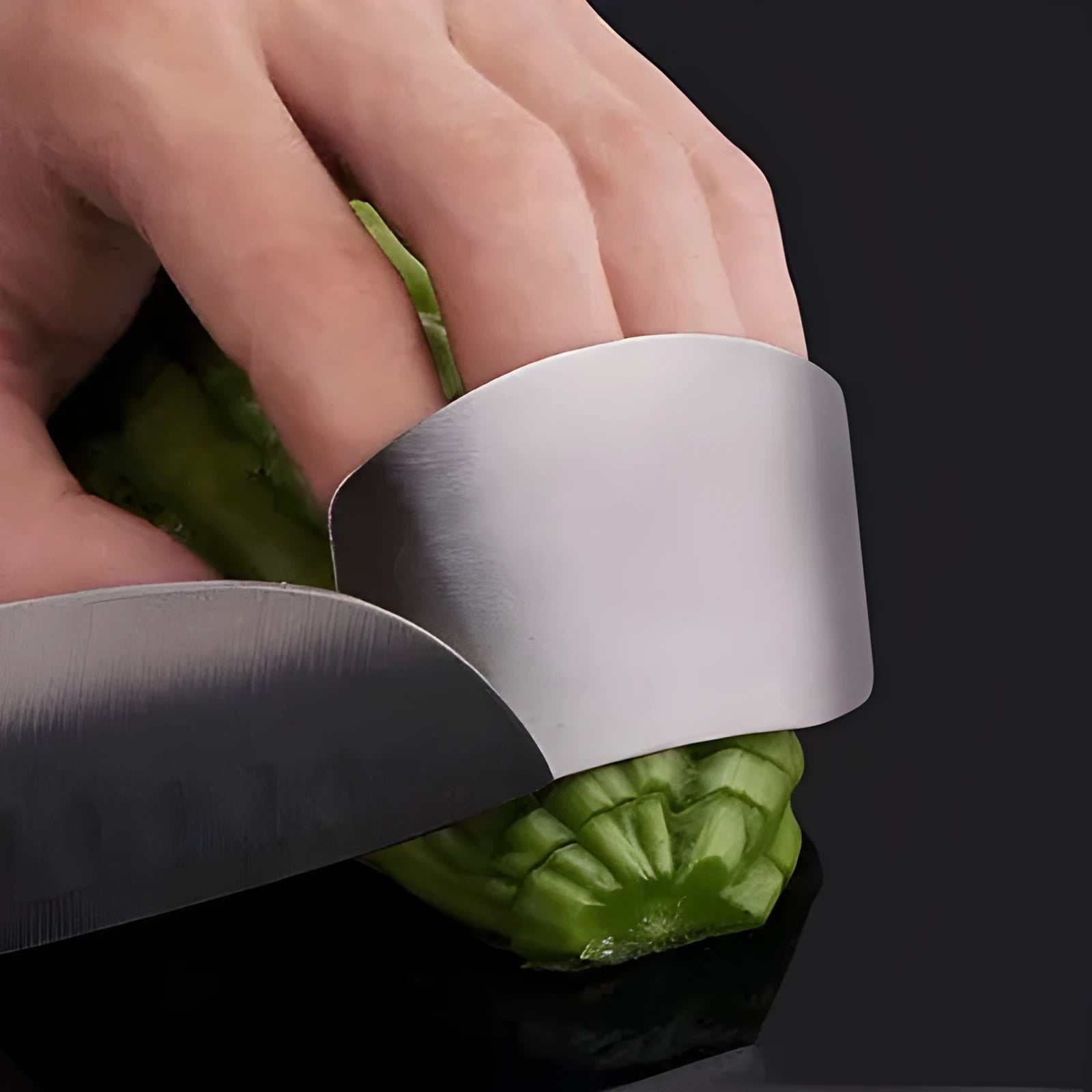 Stainless steel finger guard for kitchen use, shown in single and double-finger sizes.