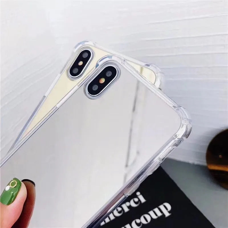 Mirror finish protective TPU case for iPhone shown in various colours.