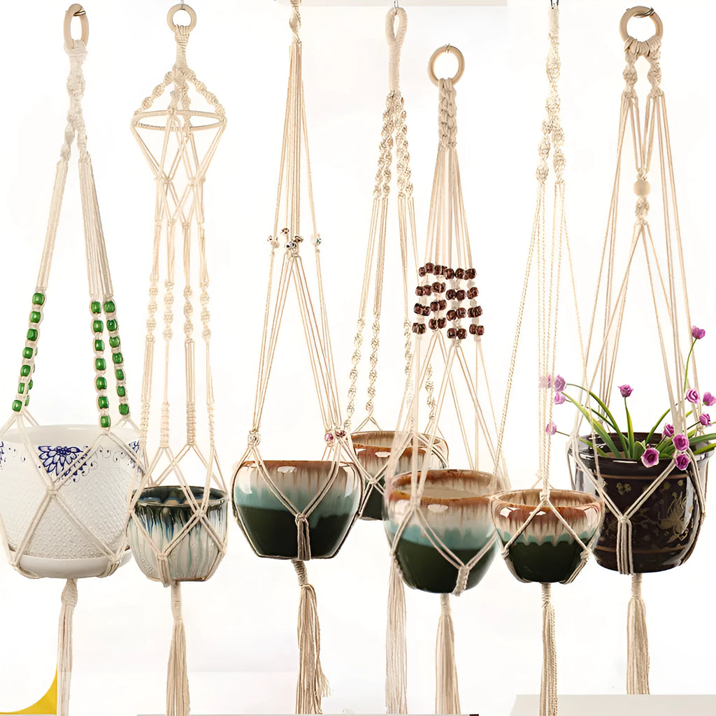 Woven cotton rope plant holder in a desktop style with greenery inside.