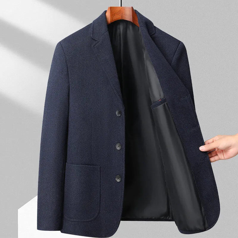 Man wearing a loose-fit solid colour polyester coat for spring or autumn.