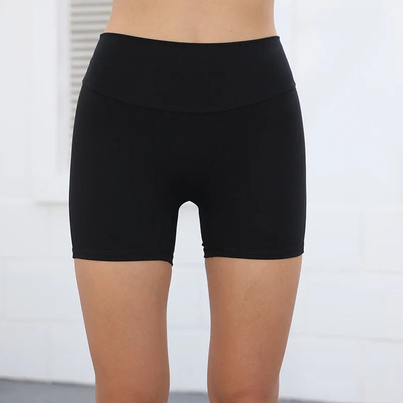 Women's high-waisted fitness shorts with pockets in various solid colours