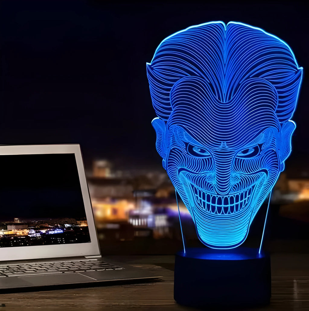 3D acrylic LED lamp on a base showing multi-colour gradient lighting, with a USB cable and remote control.