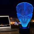 3D acrylic LED lamp on a base showing multi-colour gradient lighting, with a USB cable and remote control.