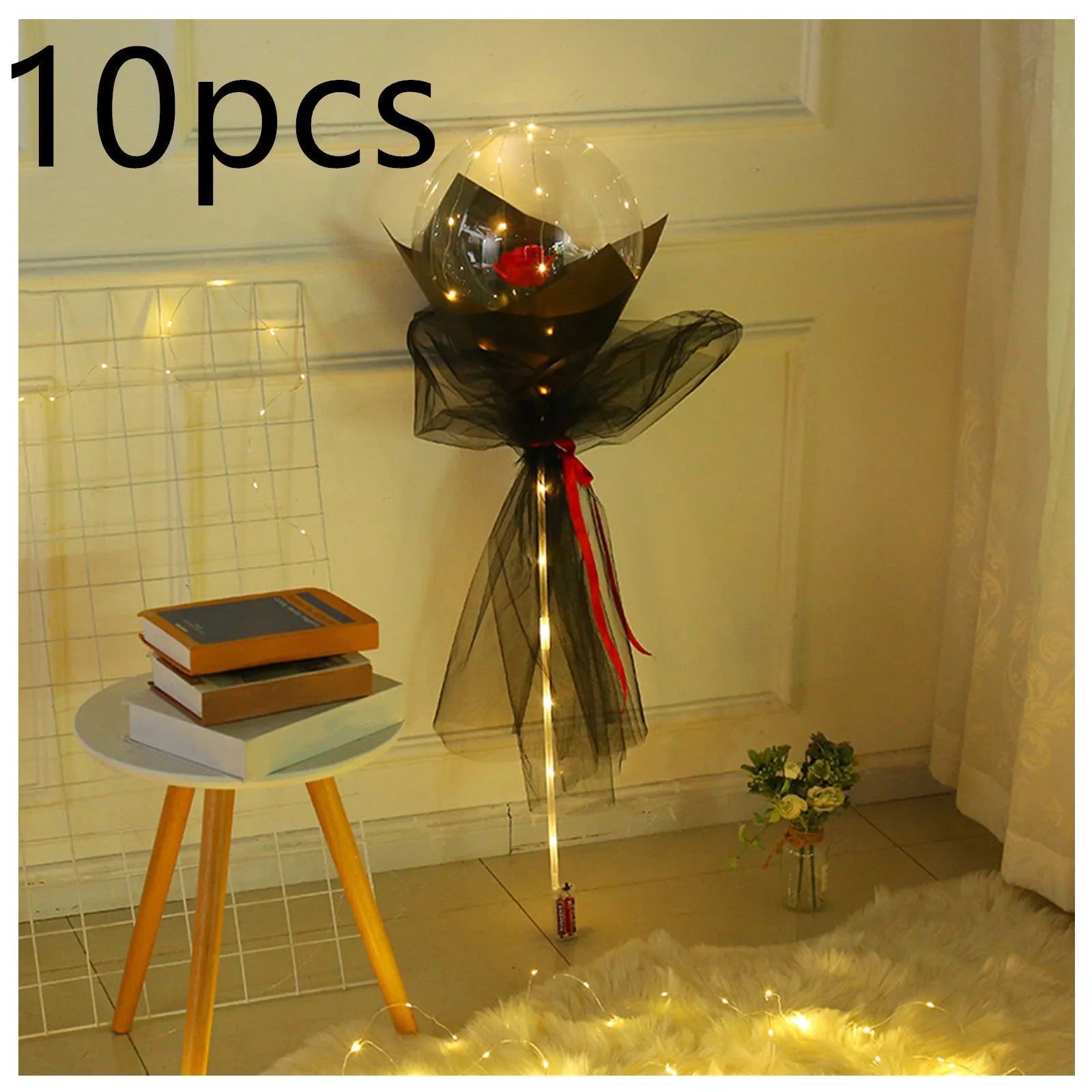 Transparent LED luminous balloon bouquet with artificial rose and glowing light inside, displayed as a DIY kit.