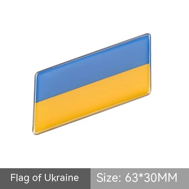 Aluminium parallelogram car sticker with national flag design measuring 6.3 by 3 cm
