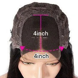 A woman wearing a long real human hair wig with a visible 4x4 lace front hairline.