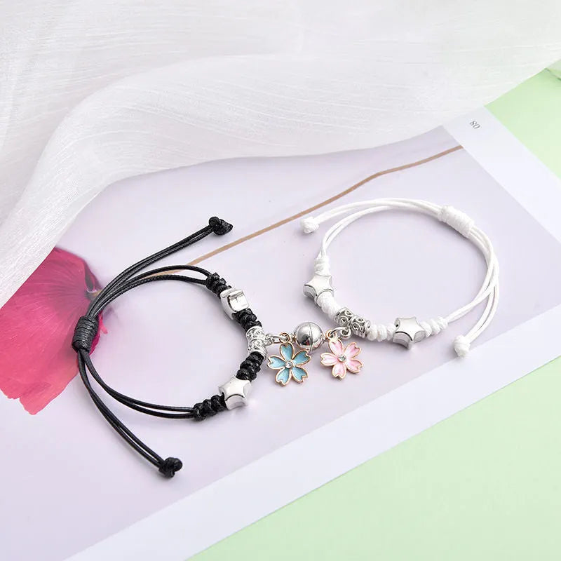Magnetic couple bracelets with crown design and electroplating finish
