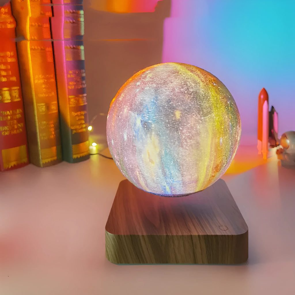 Magnetic levitation galaxy decorative light with floating moon lamp above walnut colour base