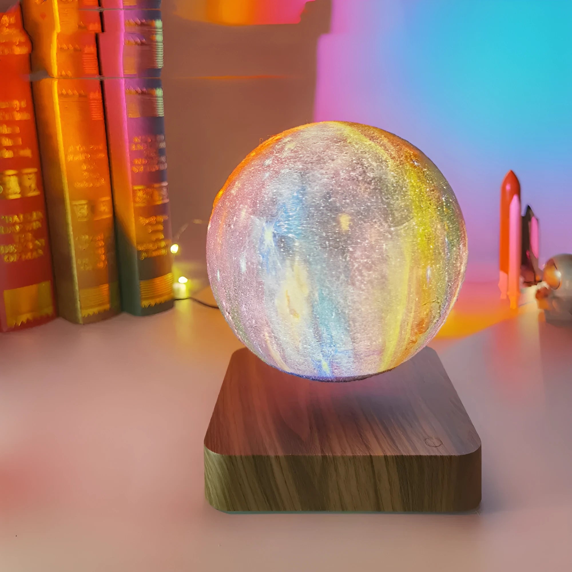 Magnetic levitation galaxy decorative light with floating moon lamp above walnut colour base