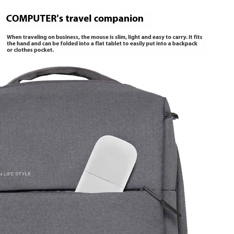Folded black Bluetooth wireless mouse showing compact 131.2mm length and touch control surface