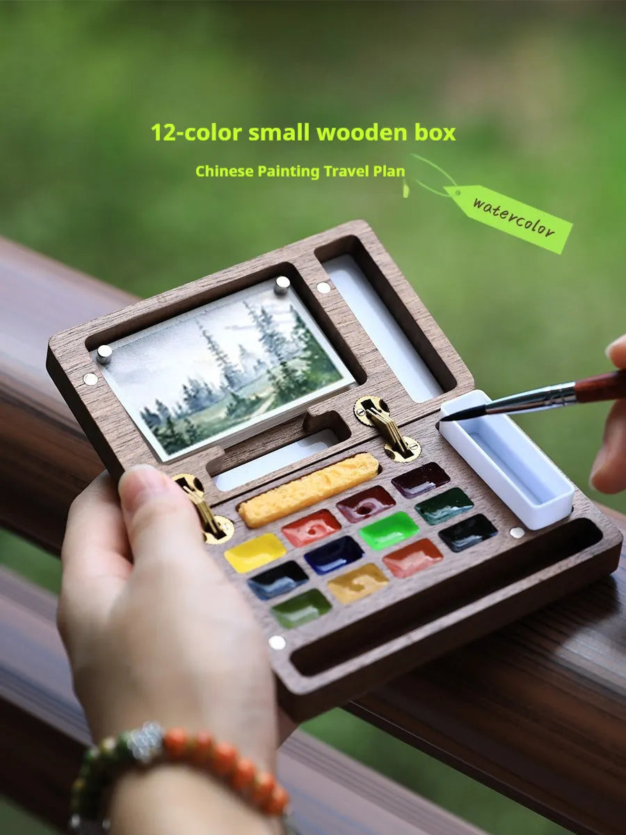Mini walnut wood watercolour paint box with internal compartments for pigment pans