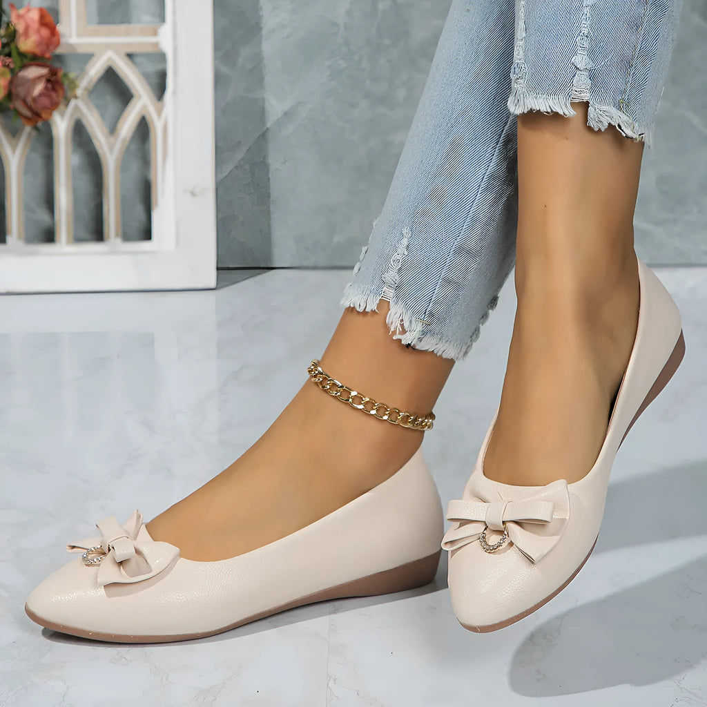 Women's beige flat casual shoes with a bowknot and shallow mouth design on a rubber sole