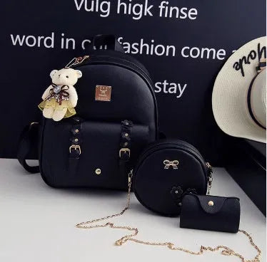Three-piece women's bag set showing backpack, shoulder bag, and card wallet in matching colour