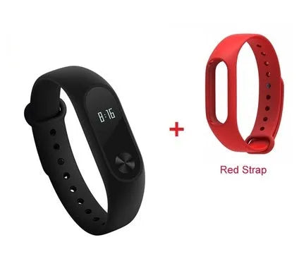 Black Xiaomi Mi Band 2 fitness tracker with OLED screen on a wrist.