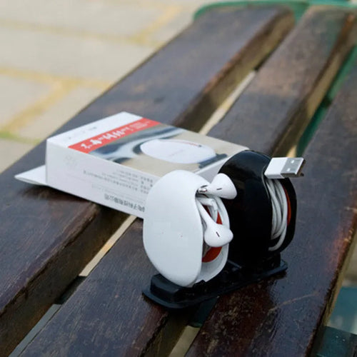 Automatic earphone retractor reel made of PC ABS in black blue and white colors with telescopic winder mechanism