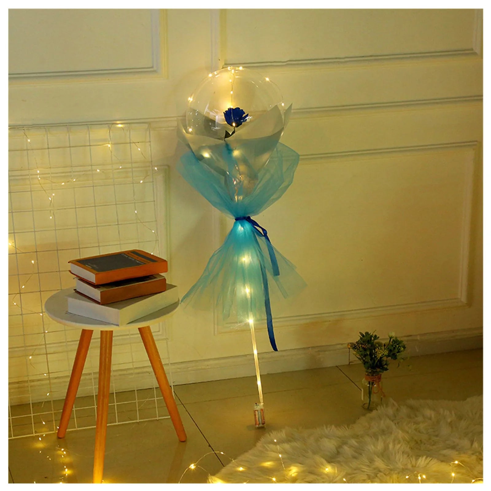 Transparent LED luminous balloon bouquet with artificial rose and glowing light inside, displayed as a DIY kit.