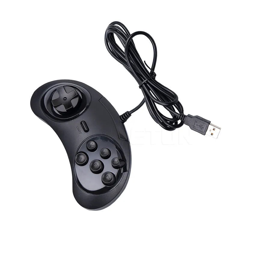 Black Sega USB computer game controller with 1.8m cable on a desk.