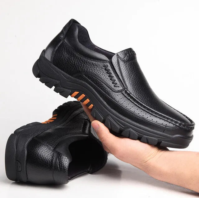 Men's black and brown leather business casual shoes with rubber soles.