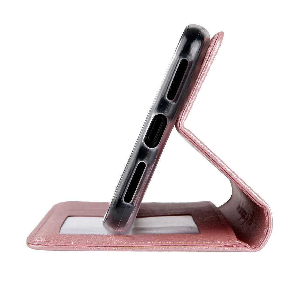 PU leather flip phone case for Apple iPhone with a built-in card slot in black.
