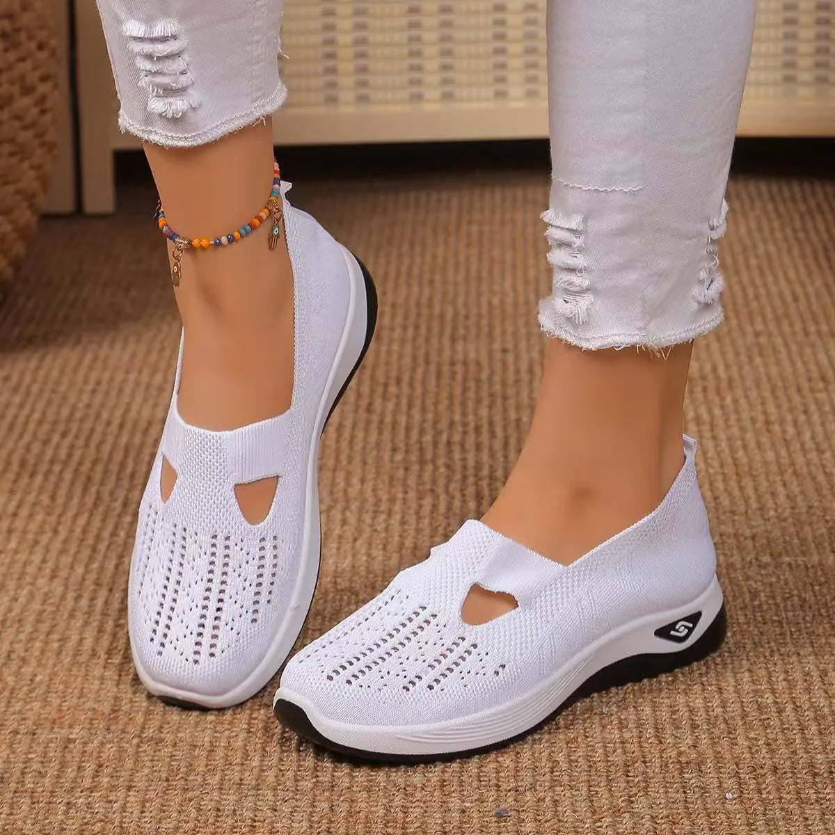 Women's casual mesh shoes with T-strap design and soft PVC soles in light purple colour