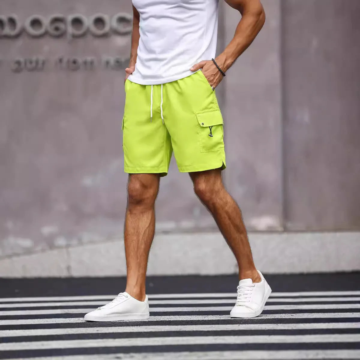 Men's loose fit work shorts in fluorescent green with straight cut design and micro-elastic fabric