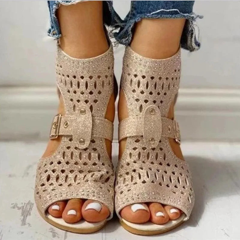 Women's beige flat sandals with wedge heel, back zipper closure, and fish mouth toe design