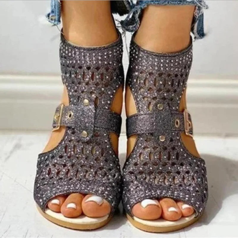 Women's beige flat sandals with wedge heel, back zipper closure, and fish mouth toe design