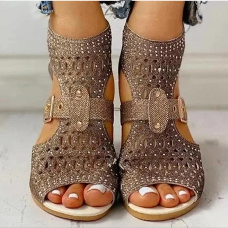 Women's beige flat sandals with wedge heel, back zipper closure, and fish mouth toe design