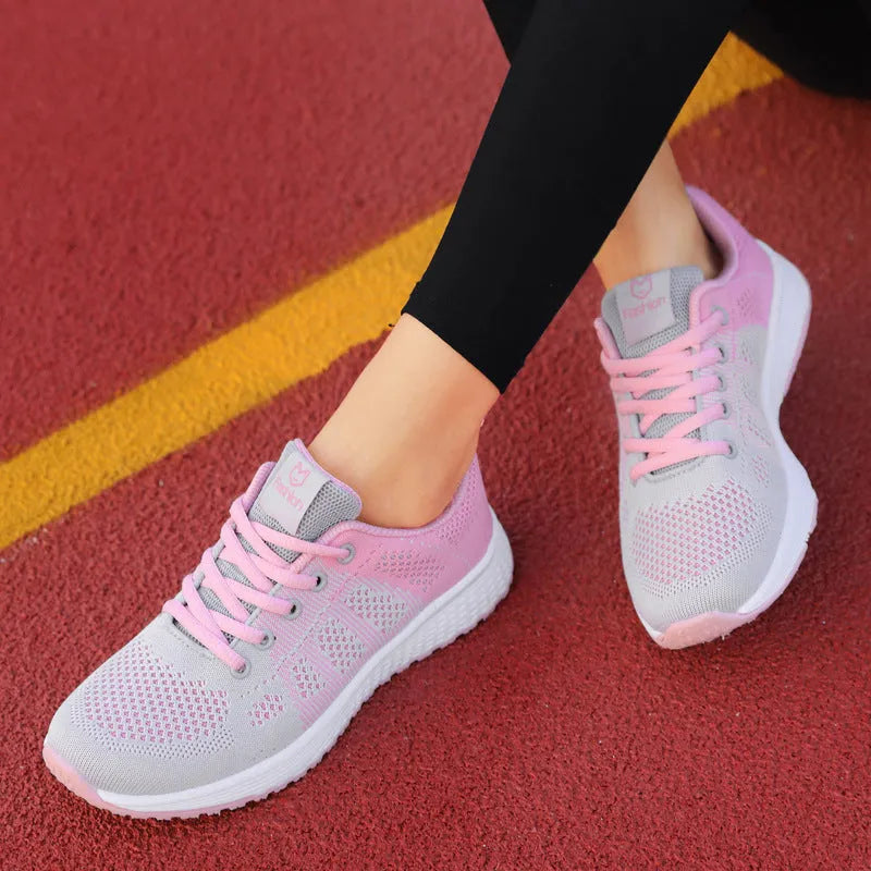 Women's white high-top casual shoe with flat board tide shoe design and back lacing.