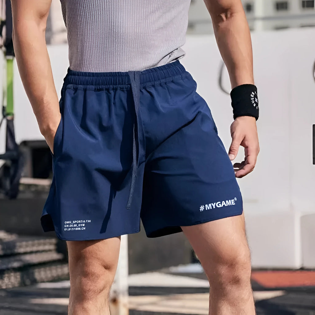 Men's grey quick-dry fitness shorts with a short-length cut for summer training.