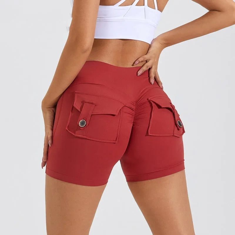 Women's high-waisted fitness shorts with pockets in various solid colours