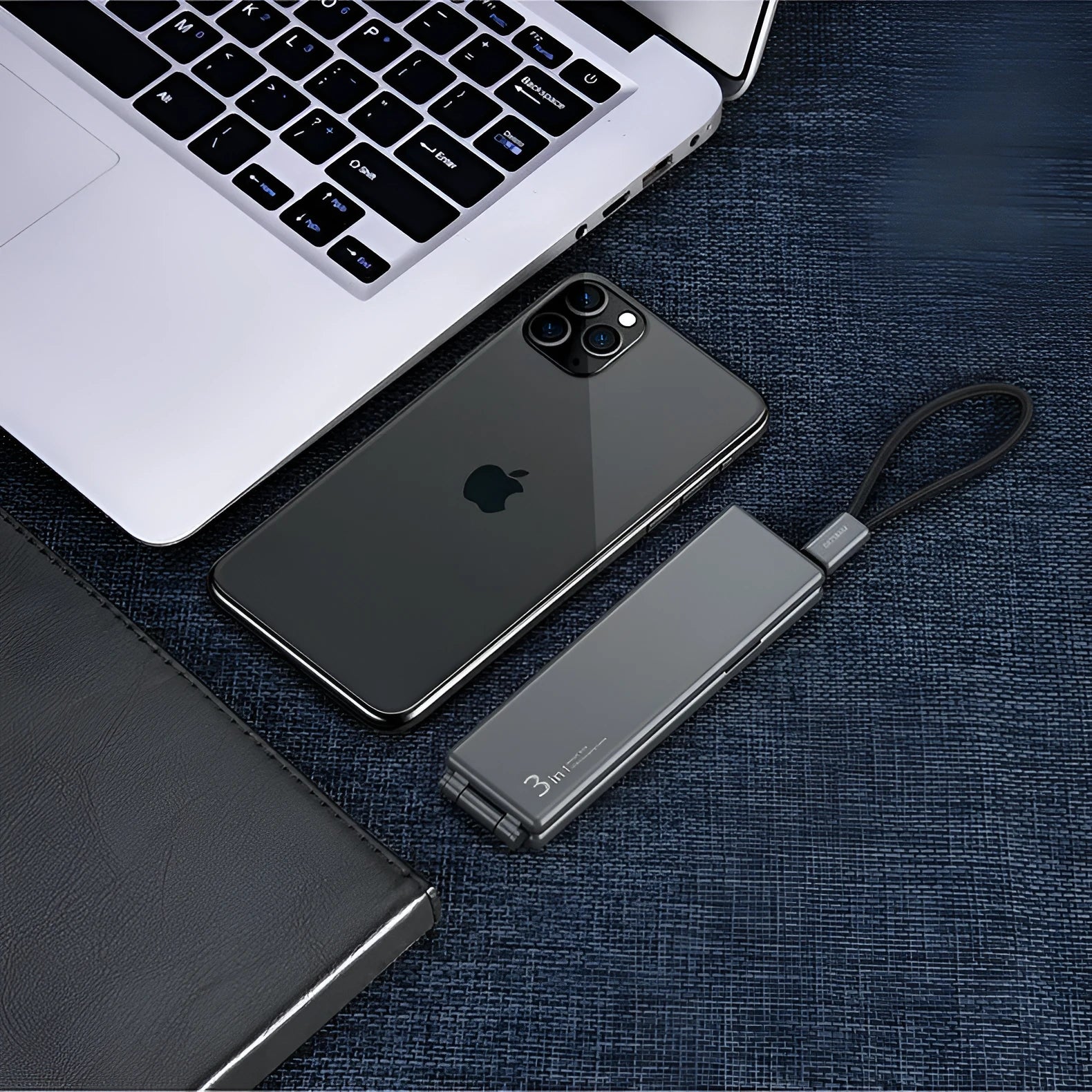 Black multifunctional USB charger cable with three connectors showing compact dimensions