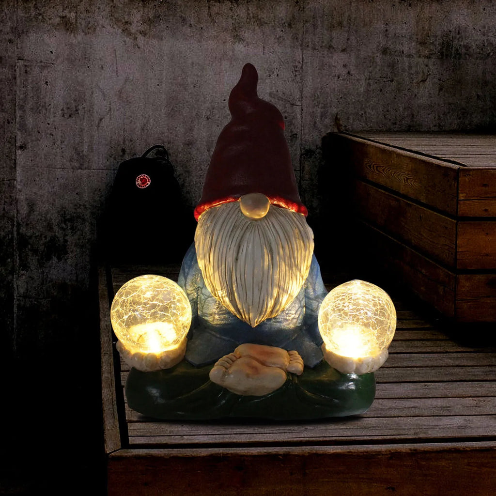 Resin dwarf garden statue with solar LED lights in faceless old man design.