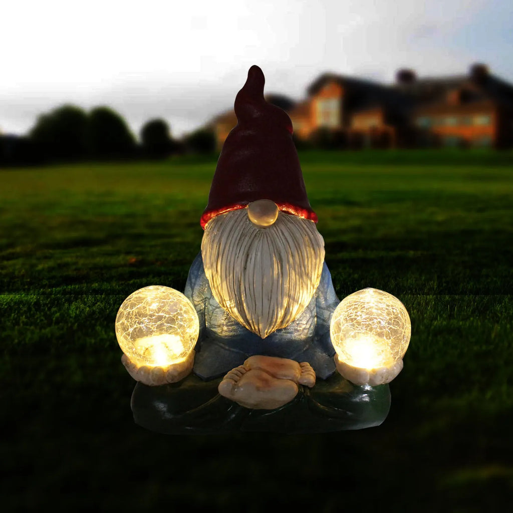 Resin dwarf garden statue with solar LED lights in faceless old man design.