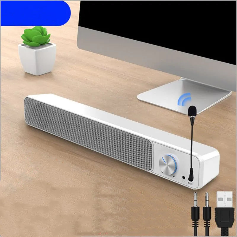 Black and white desktop computer speaker with wired audio connection and 2.0 channel stereo output