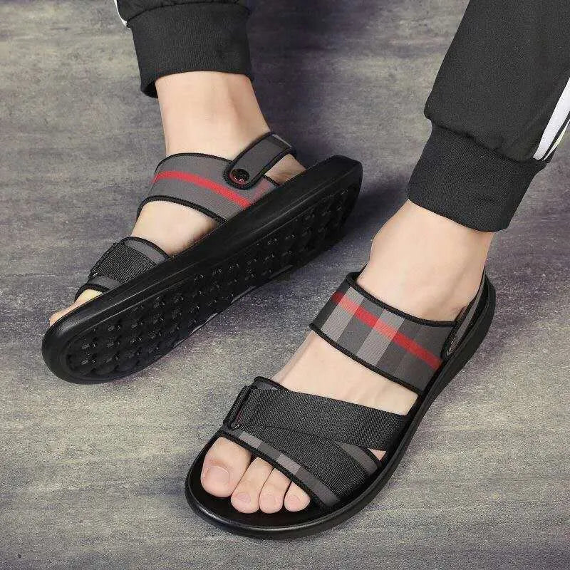 A pair of leisure-style sandals with a Lycra upper and Polyurethane sole for youth summer wear.