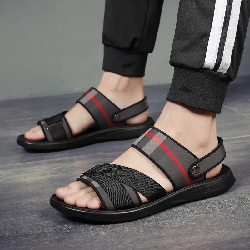 A pair of leisure-style sandals with a Lycra upper and Polyurethane sole for youth summer wear.