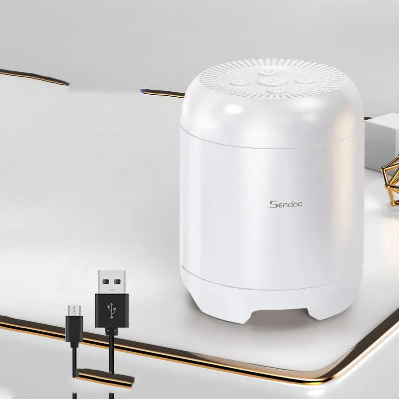 Compact black or white wireless Bluetooth speaker with super subwoofer measuring 90x73x73mm